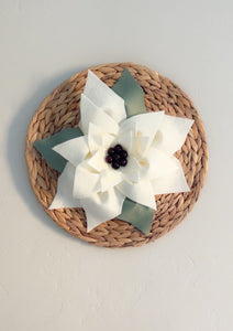 White Poinsettia on Round Rattan Decor