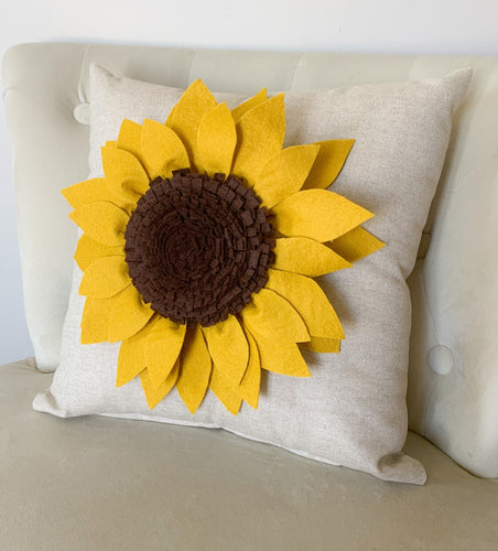 Decorative Pillow with Mustard yellow Sunflower made from wool felt on oatmeal colored pillow