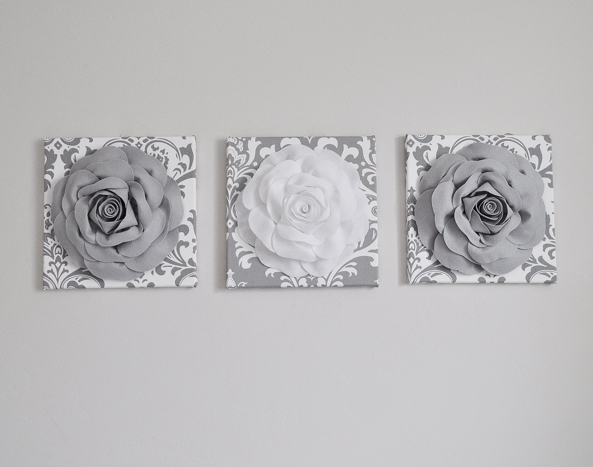 Wall Mural three dried roses on white 